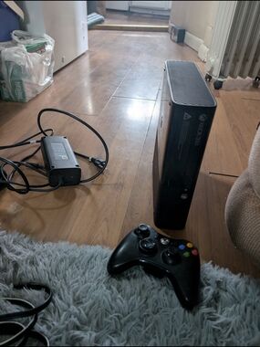 Xbox 360 Slim Console with Black Wireless Controller
